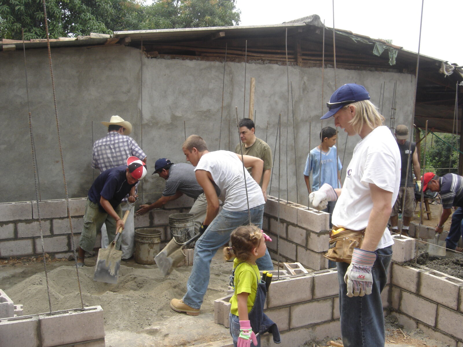 a group of people building a house