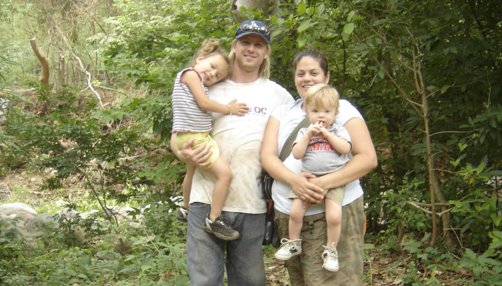 A family of four in nature