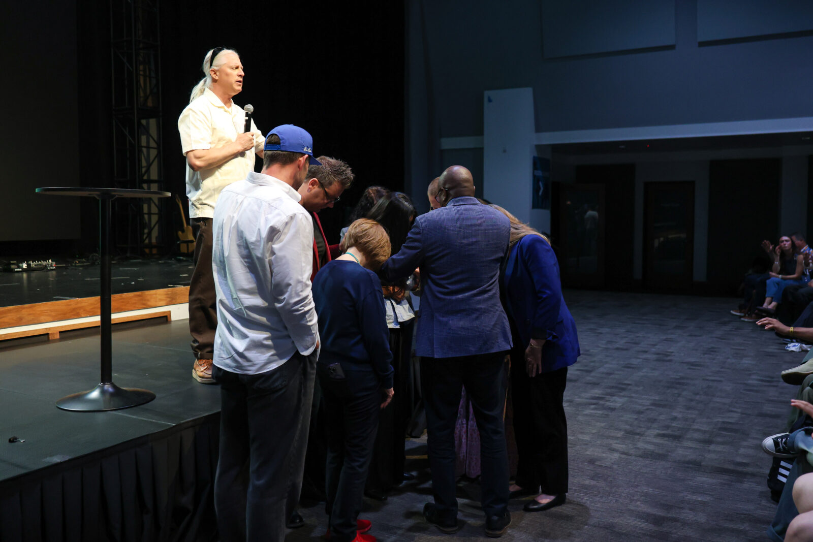 group of people praying